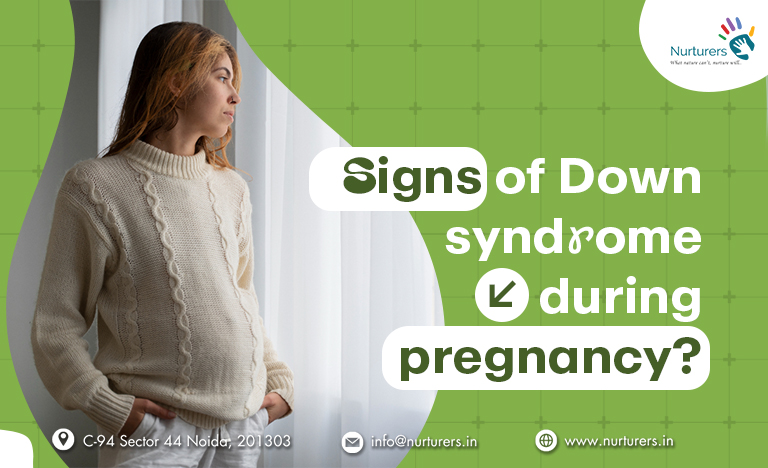 Pregnant woman with text "Signs of Down syndrome during pregnancy?"